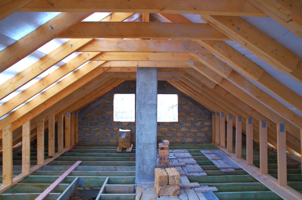 Boarded loft storage and ladder fitting by Hallam Headway